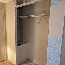 How-Mr-Genie-Handyman-Replaced-Old-Closet-Doors-with-Upgraded-Panel-Doors 1
