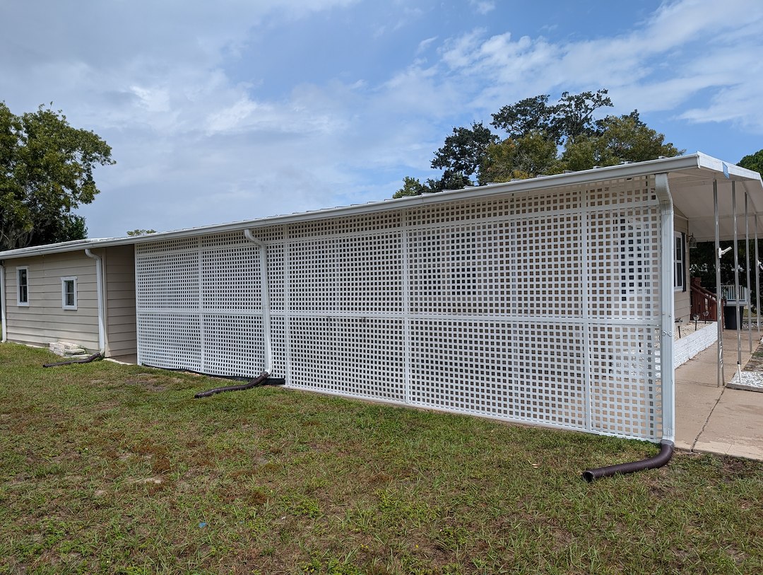 Mr. Genie Handyman, Spring Hill's Go-To Handyman, recently transformed a local carport with expert vinyl lattice reconstruction.